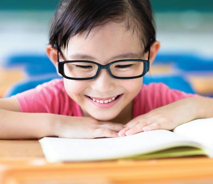 child-reading-myopia-696x603.jpg